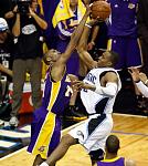 Kobe blocks Dwight Howard...