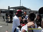 Trufant signing autographs